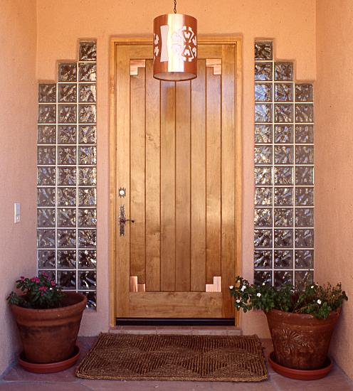Plank style door with copper corners
