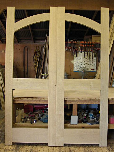 white oak double doors with top arch