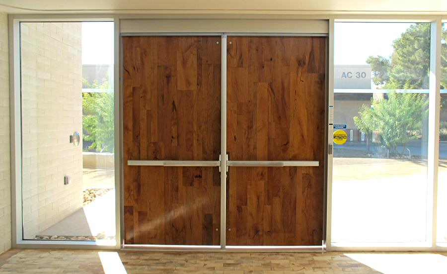 Interior view of the mesquite veneer doors at the Mesa Community Art Gallery