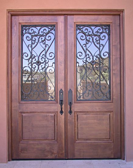 Mexican stlye double doors with hainge wrought iron grill