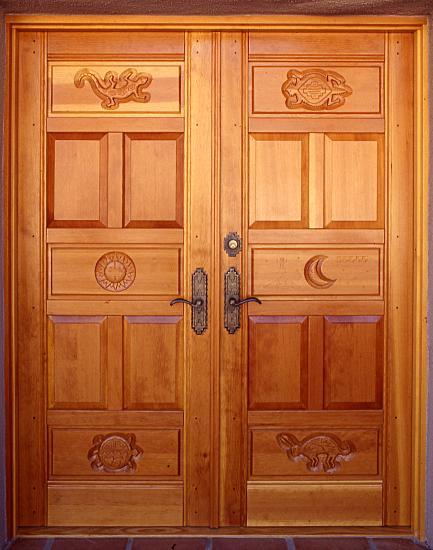 Double doors with Mimbres Indian carvings