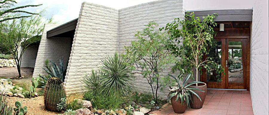 angled brick with trapazoid mesquite doors