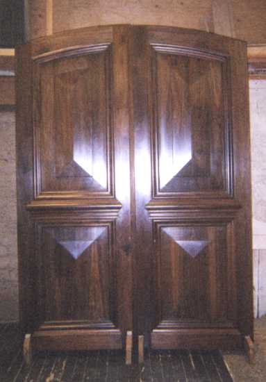 Walnut Entry Doors with Arched Top